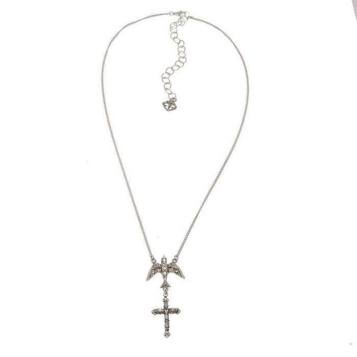 Silver necklace featuring a bird above a cross pendant