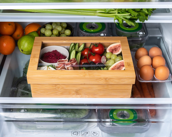 Bamboo grazing box stored in fridge with food