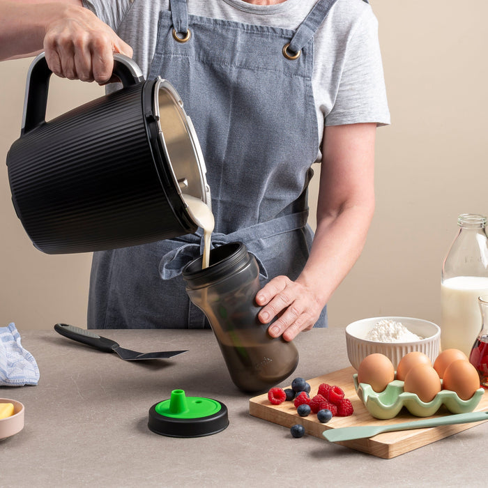 Pouring pancake batter into batter dispenser