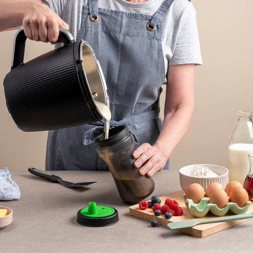 Pouring pancake batter into batter dispenser