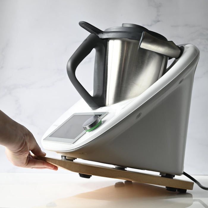 Beechwood thermomix gliderboard being moved across counter