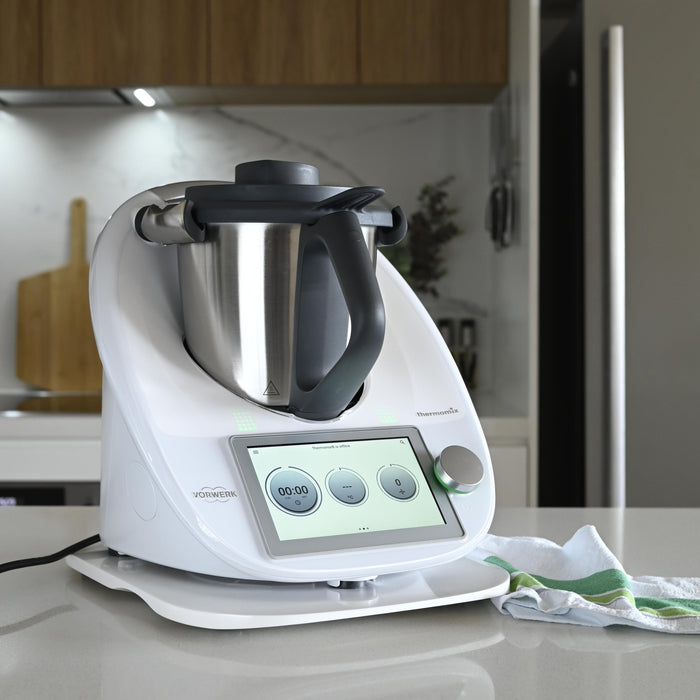 Thermomix® glider board shown on kitchen bench for practical use