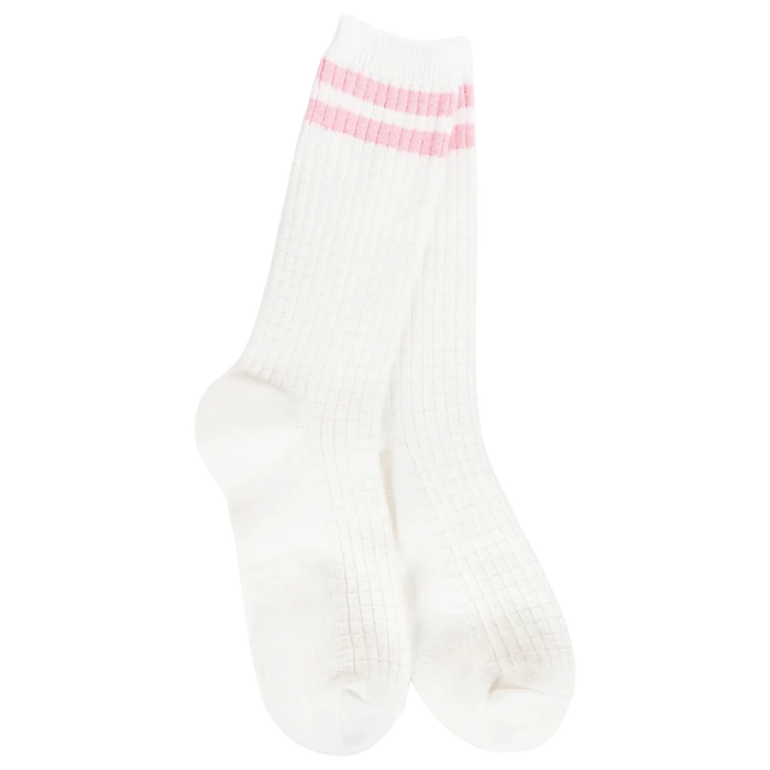 Women's ivory waffle-knit crew socks featuring soft pink athletic stripes and a cozy textured design.